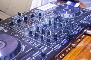 close up of a dj mixer, dj control panel photo