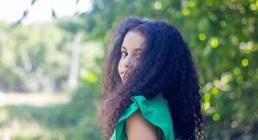 pretty young girl in the nature photo