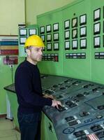 industrial worker at the work in factory photo