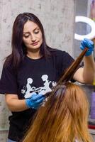 pretty young woman in beauty salon photo