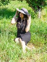 pretty young woman in the nature, summer scenery photo