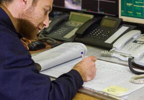 industrial worker at the workstation photo