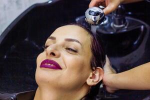 pretty young woman in spa salon photo