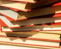 stack of books on the table, pile of books, books background photo