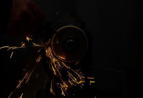 sparks of a metal in the factory photo