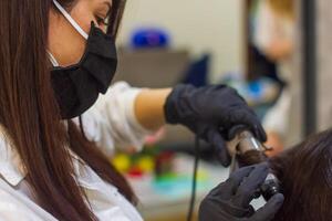 young woman in spa salon, girl in beauty salon photo