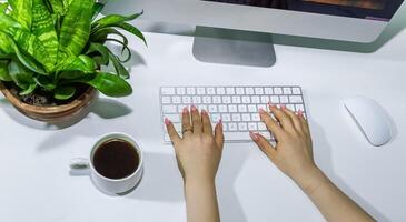 hands typing on a keyboard, hands on keyboard photo