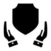 Shield inside hand, icon of security shield vector