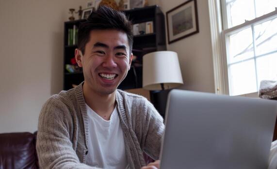 AI generated A man happily using laptop in his home, labour day photo