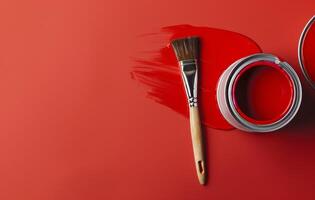 AI generated Paint can and brush on red background, artistic celebrations idea photo