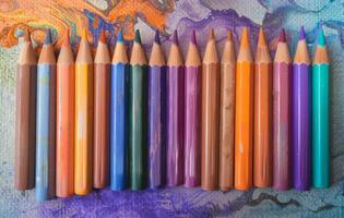 AI generated Various colored pencils arranged in a row, world art day image photo