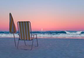 playa silla y paraguas en contra Oceano puesta de sol foto
