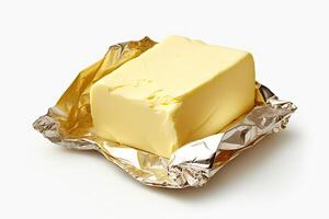 AI generated Golden butter in luxurious foil packaging isolated on white background. created with Generative AI photo