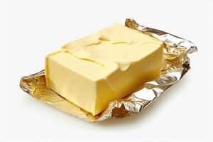 AI generated Golden butter in luxurious foil packaging isolated on white background. created with Generative AI photo