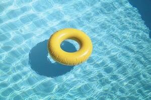 AI generated Summer Yellow Swimming Pool Ring Float in Blue Water. created with Generative AI photo