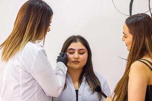 pretty young womans in beauty salon photo