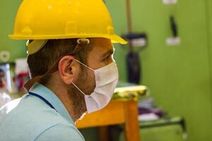 industrial worker at the workstation photo