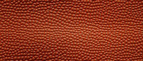 AI generated Textured Red Leather Close-Up Background. Close-up of red leather texture with a pattern of interwoven lines, suitable for backgrounds or detailing photo