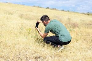 pretty young man in the nature photo