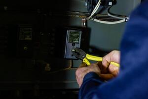 industrial worker with yellow helmet at the work photo