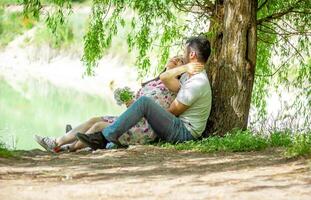 romantic couple in the garden, couple in the nature photo