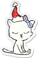 Hand gezeichnet betrübt Aufkleber Karikatur von ein Katze mit Bogen auf Kopf tragen Santa Hut png