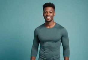 AI Generated Muscular man in a fitted green tee, his broad smile and athletic build indicating a healthy, active lifestyle. photo