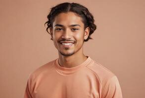 AI Generated A friendly looking young man with curly hair smiles warmly. Soft peach background enhances the pleasant feel. photo