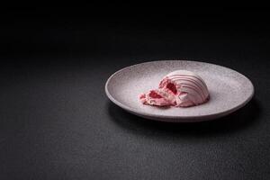 Delicious sweet colorful mochi desserts or ice cream with rice dough and toppings photo