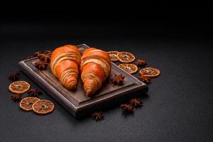 Delicious fresh, crispy French croissants with sweet filling photo