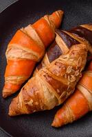 Delicious fresh, crispy French croissants with sweet filling photo