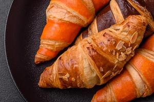 Delicious fresh, crispy French croissants with sweet filling photo