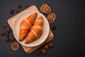 Delicious fresh, crispy French croissants with sweet filling photo