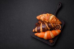 Delicious fresh, crispy French croissants with sweet filling photo