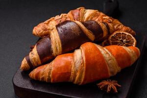 Delicious fresh, crispy French croissants with sweet filling photo