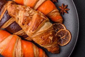 Delicious fresh, crispy French croissants with sweet filling photo