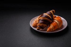 Delicious fresh, crispy French croissants with sweet filling photo