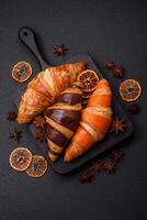 Delicious fresh, crispy French croissants with sweet filling photo