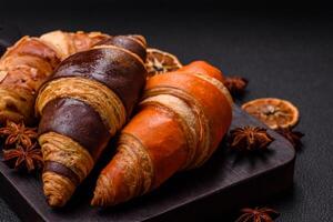 Delicious fresh, crispy French croissants with sweet filling photo