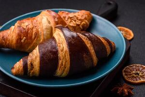 Delicious fresh, crispy French croissants with sweet filling photo