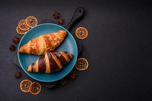 Delicious fresh, crispy French croissants with sweet filling photo