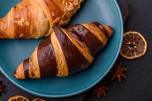 Delicious fresh, crispy French croissants with sweet filling photo