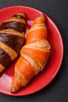 Delicious fresh, crispy French croissants with sweet filling photo