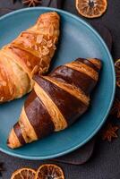 Delicious fresh, crispy French croissants with sweet filling photo