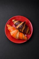 Delicious fresh, crispy French croissants with sweet filling photo