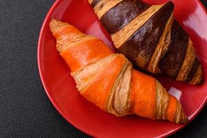 Delicious fresh, crispy French croissants with sweet filling photo