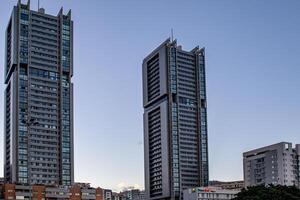 Modern skyscrapers against a clear blue sky in an urban cityscape in Santa Cruz de Tenerife photo