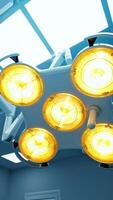 Powerful rotating yellow-light lamp in the ceiling of surgery room. White illumination installed into the ceiling of the operational theatre. Low angle view. Vertical video