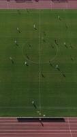 Vertical Video of Soccer Match in Stadium Aerial View