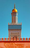 AI generated The sophisticated patterns on a minaret tower shine brightly against a vivid blue sky photo